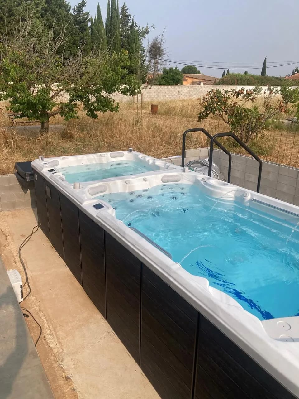 Installation d'un spa de nage Risør 600 Full option à Arles, autre vue du chantier